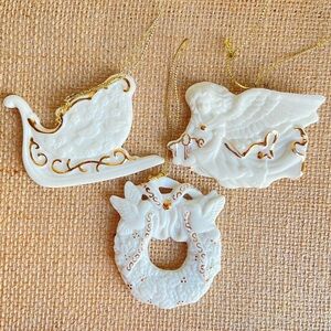 Avon ornament set with 24k gold accents in bisque porcelain sled wreath angel